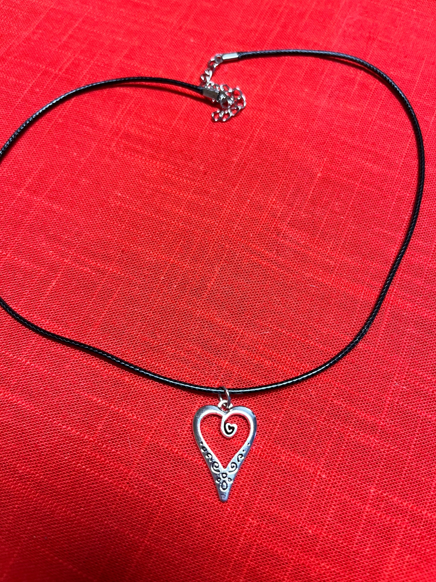 Silver heart black cord necklace